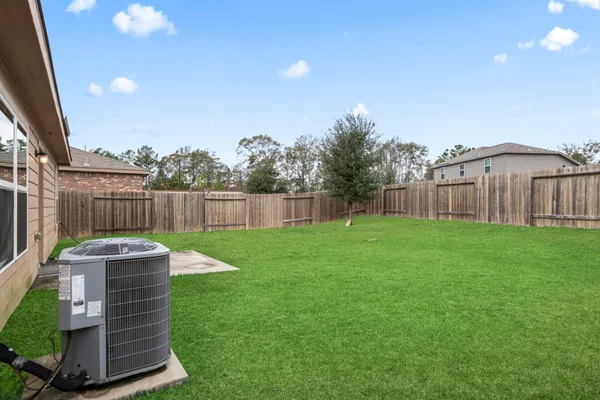 a view of a yard in front of house