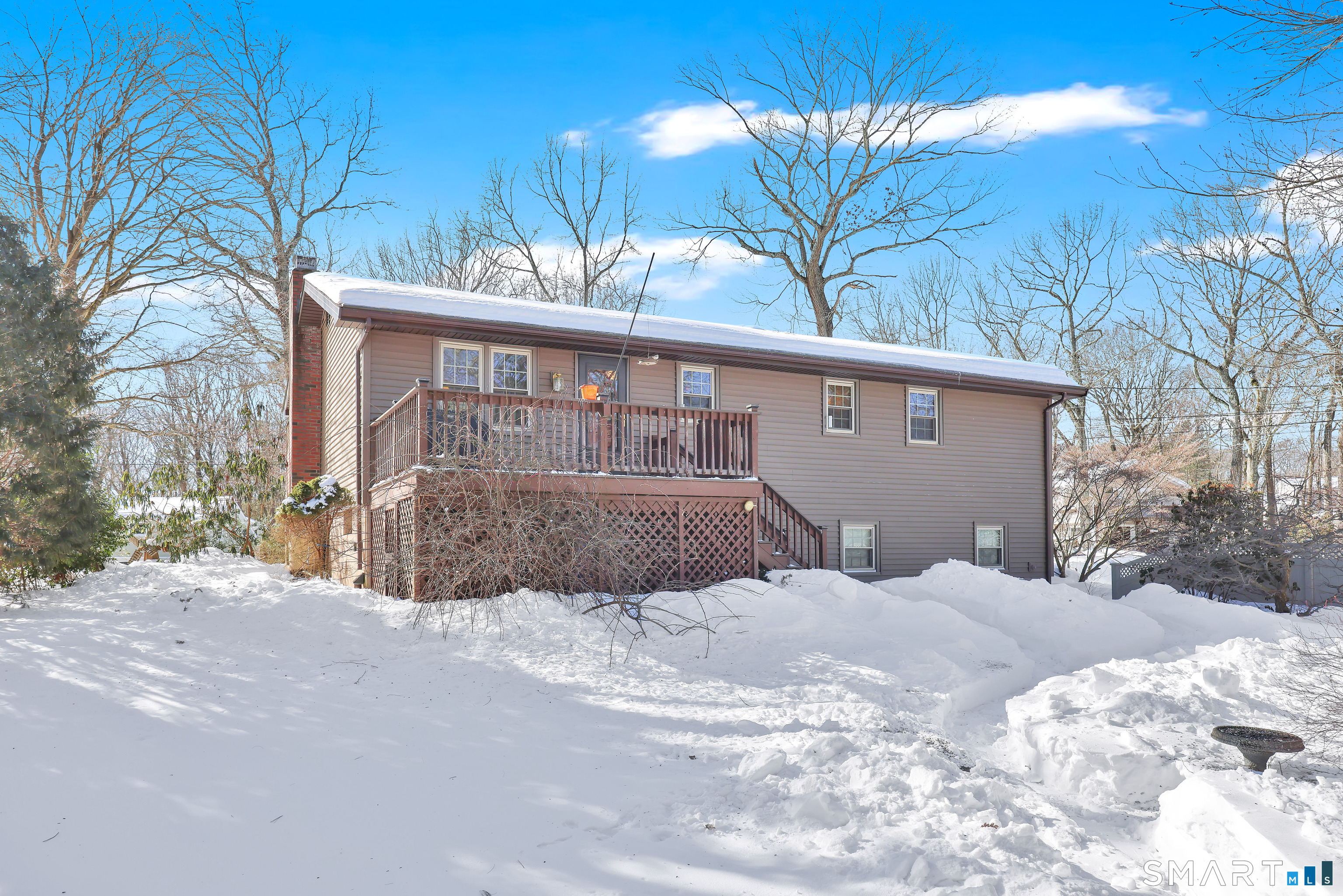 102 Robin Circle Tolland, CT 06084 - Photo 33 of 37 a view of a house with a snow in the yard
