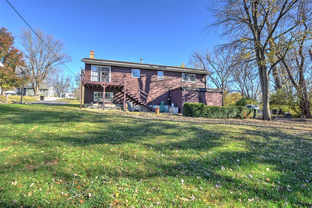 3441 Ferris Drive Decatur, IL 62521 - Photo 25 of 30 a view of a house with a big yard and large trees