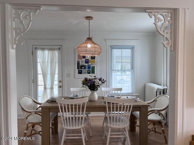 113 Webb Avenue, Unit WINTER Ocean Grove, NJ 07756 - Photo 22 of 31 a view of a dining room with furniture and chandelier