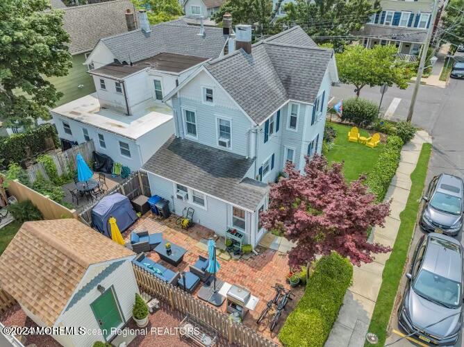 113 Webb Avenue, Unit WINTER Ocean Grove, NJ 07756 - Photo 3 of 31 an aerial view of a house with a garden and plants