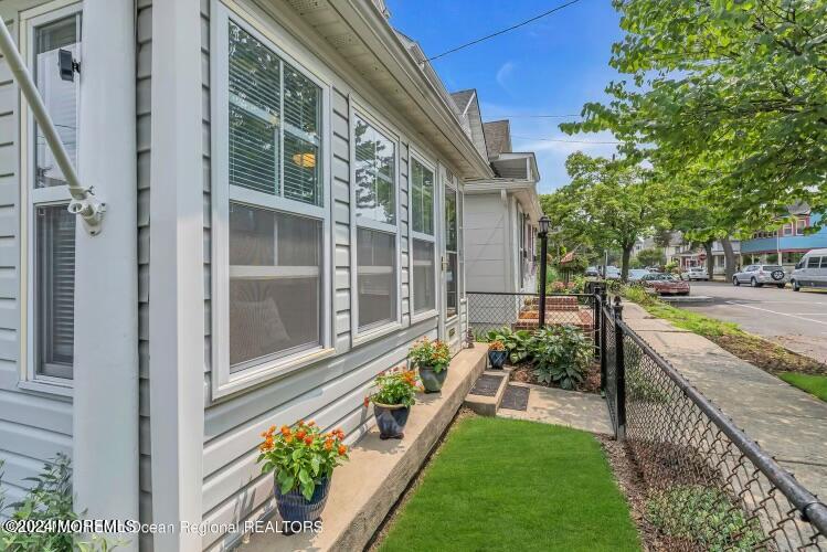113 Webb Avenue, Unit WINTER Ocean Grove, NJ 07756 - Photo 4 of 31 a view of a large building with a swimming pool