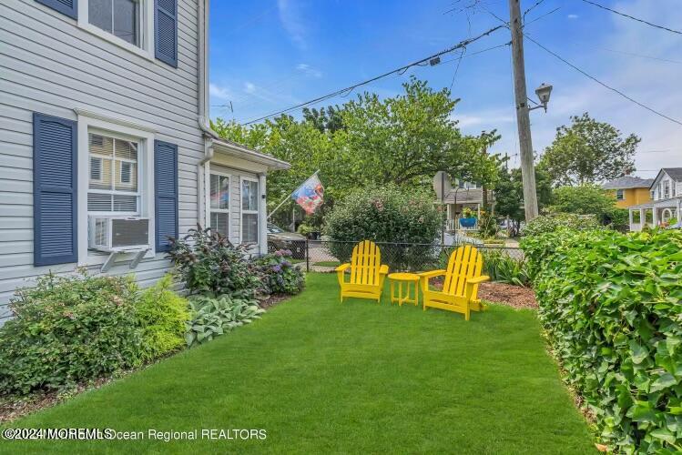 113 Webb Avenue, Unit WINTER Ocean Grove, NJ 07756 - Photo 5 of 31 a view of a house with a backyard patio and swimming pool