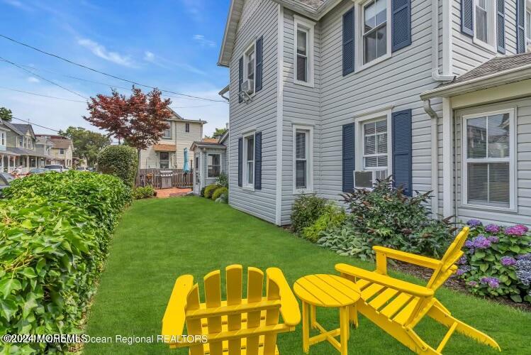 113 Webb Avenue, Unit WINTER Ocean Grove, NJ 07756 - Photo 6 of 31 a view of a house with a backyard