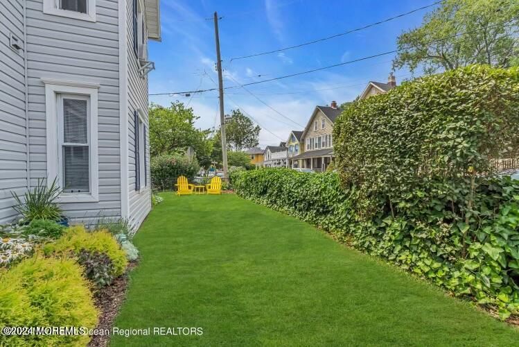 113 Webb Avenue, Unit WINTER Ocean Grove, NJ 07756 - Photo 7 of 31 a view of yard with green space