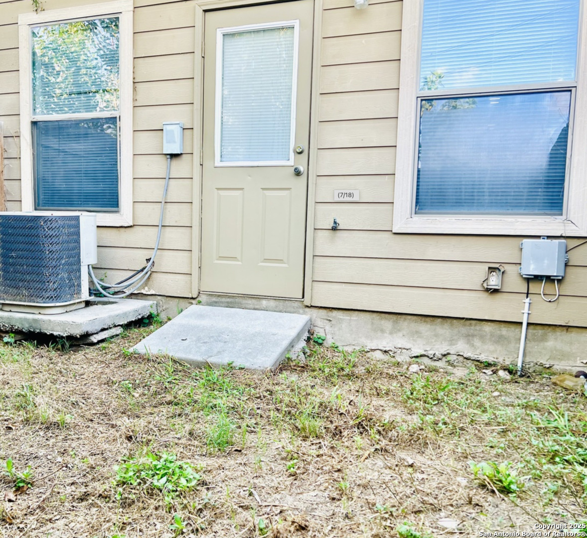 7301 Longing Trail, Unit 1 San Antonio, TX 78244 - Photo 15 of 16 a backyard of a house