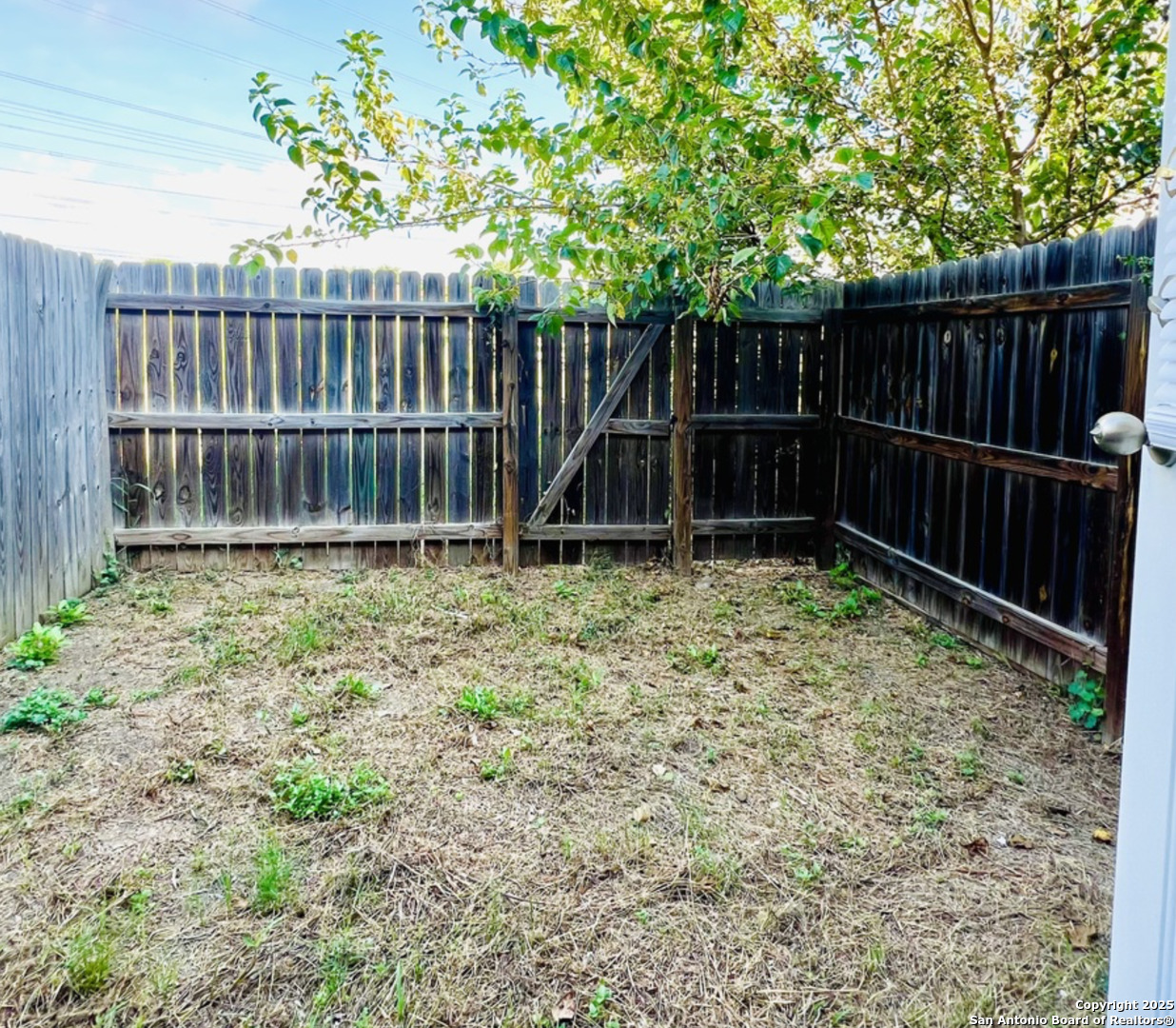 7301 Longing Trail, Unit 1 San Antonio, TX 78244 - Photo 16 of 16 a garden with wooden fence