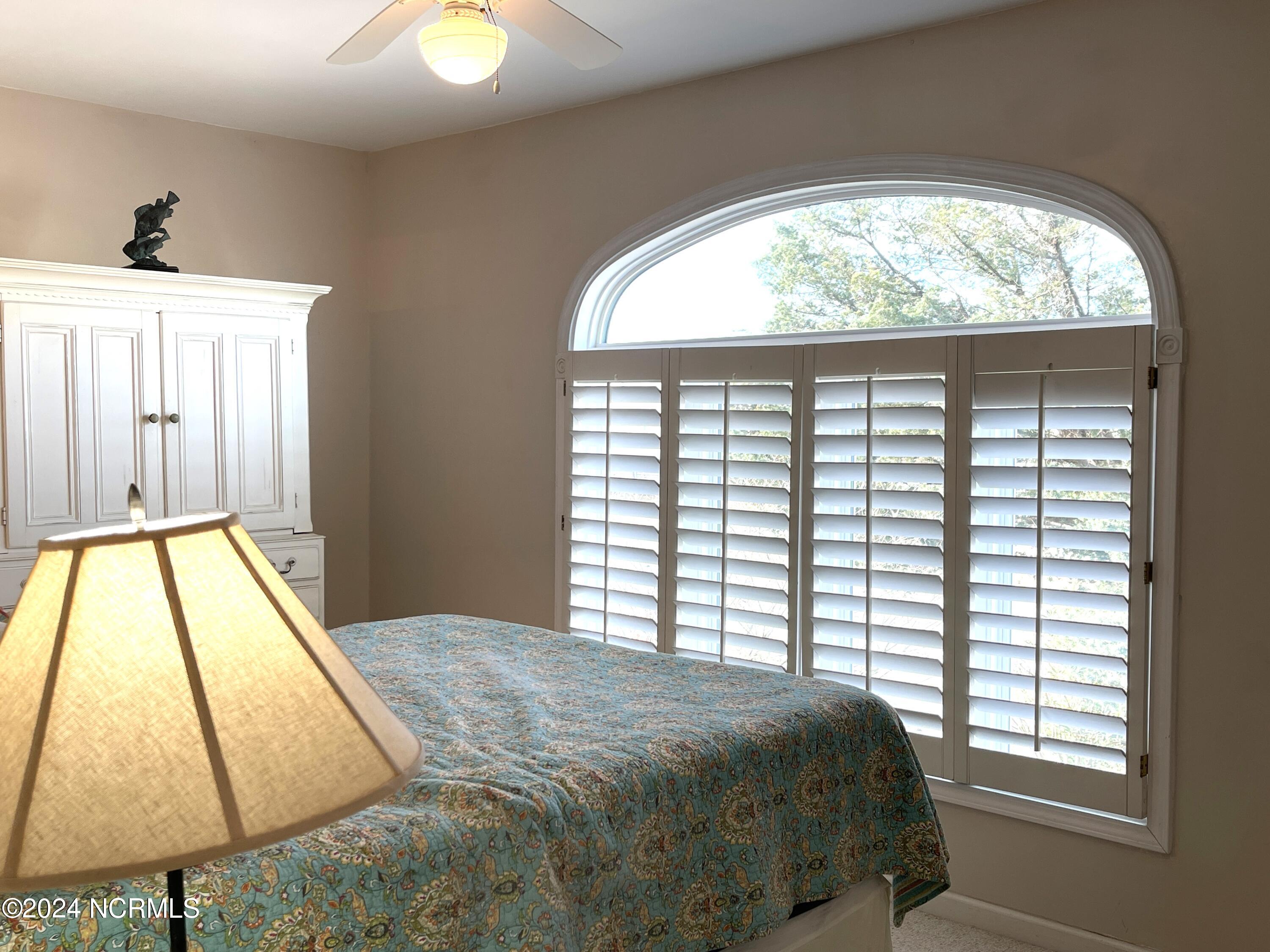 1006 East Main Street, Unit B Sunset Beach, NC 28468 - Photo 12 of 39 Guest Bedroom #1 Primary Level