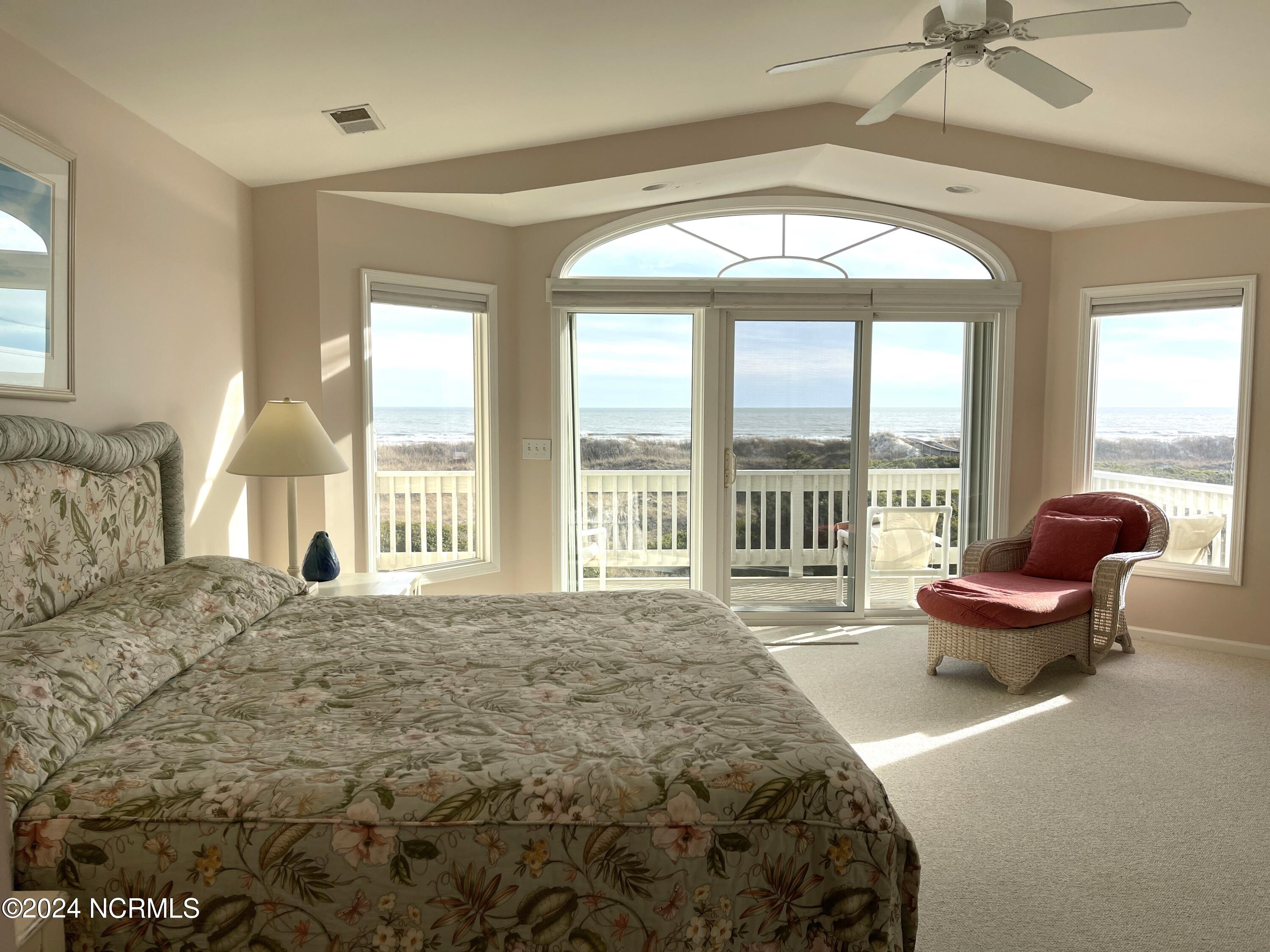 1006 East Main Street, Unit B Sunset Beach, NC 28468 - Photo 25 of 39 Primary Bedroom Second Level
