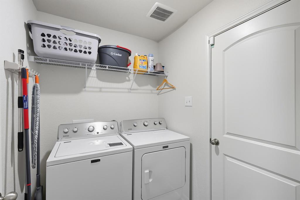 13511 Mineral Road Ponder, TX 76259 - Photo 22 of 40 a utility room with dryer and washer