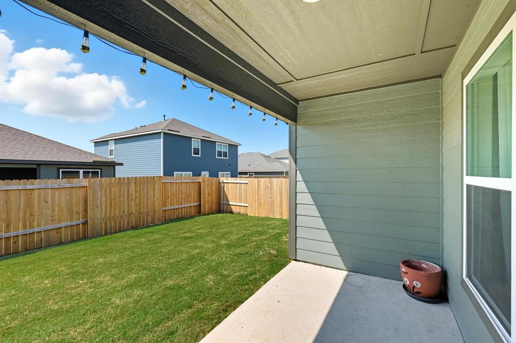 13511 Mineral Road Ponder, TX 76259 - Photo 31 of 40 a view of a back yard of the house