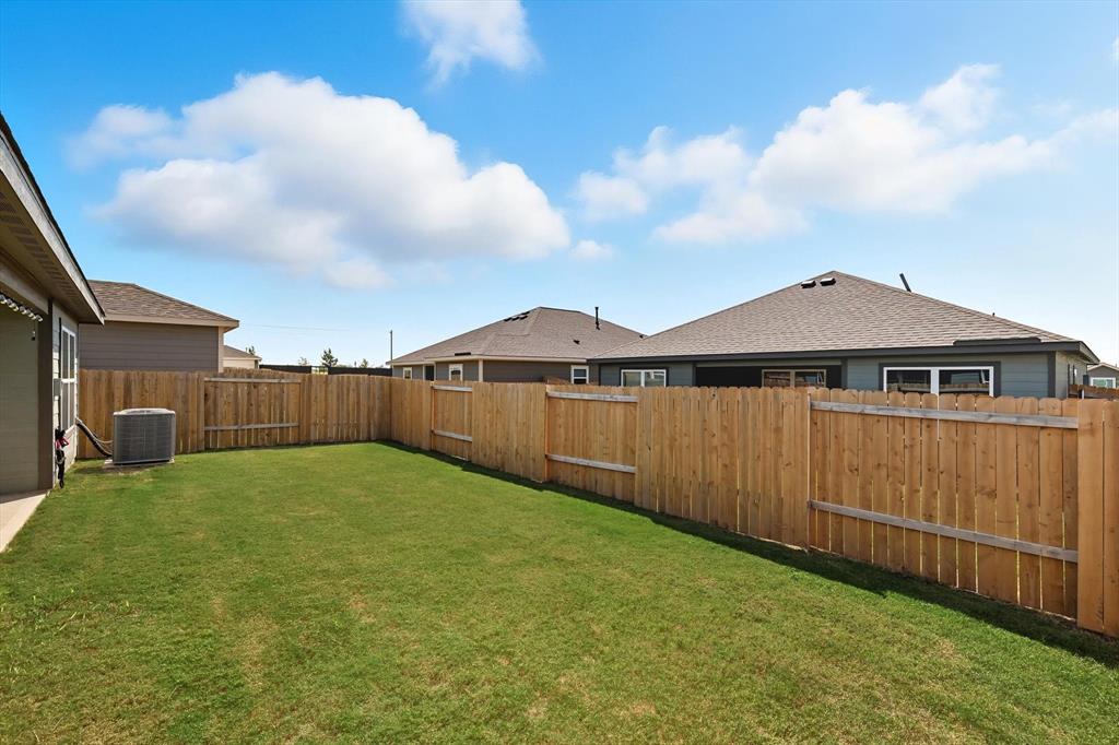 13511 Mineral Road Ponder, TX 76259 - Photo 33 of 40 a front view of a house with a yard