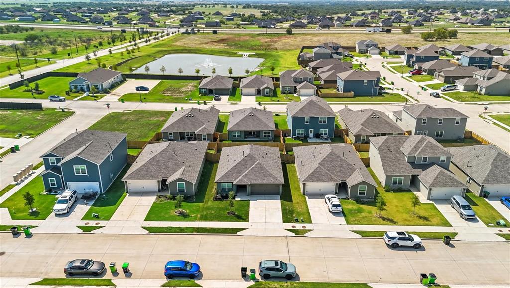 13511 Mineral Road Ponder, TX 76259 - Photo 38 of 40 an aerial view of residential houses with outdoor space and ocean view