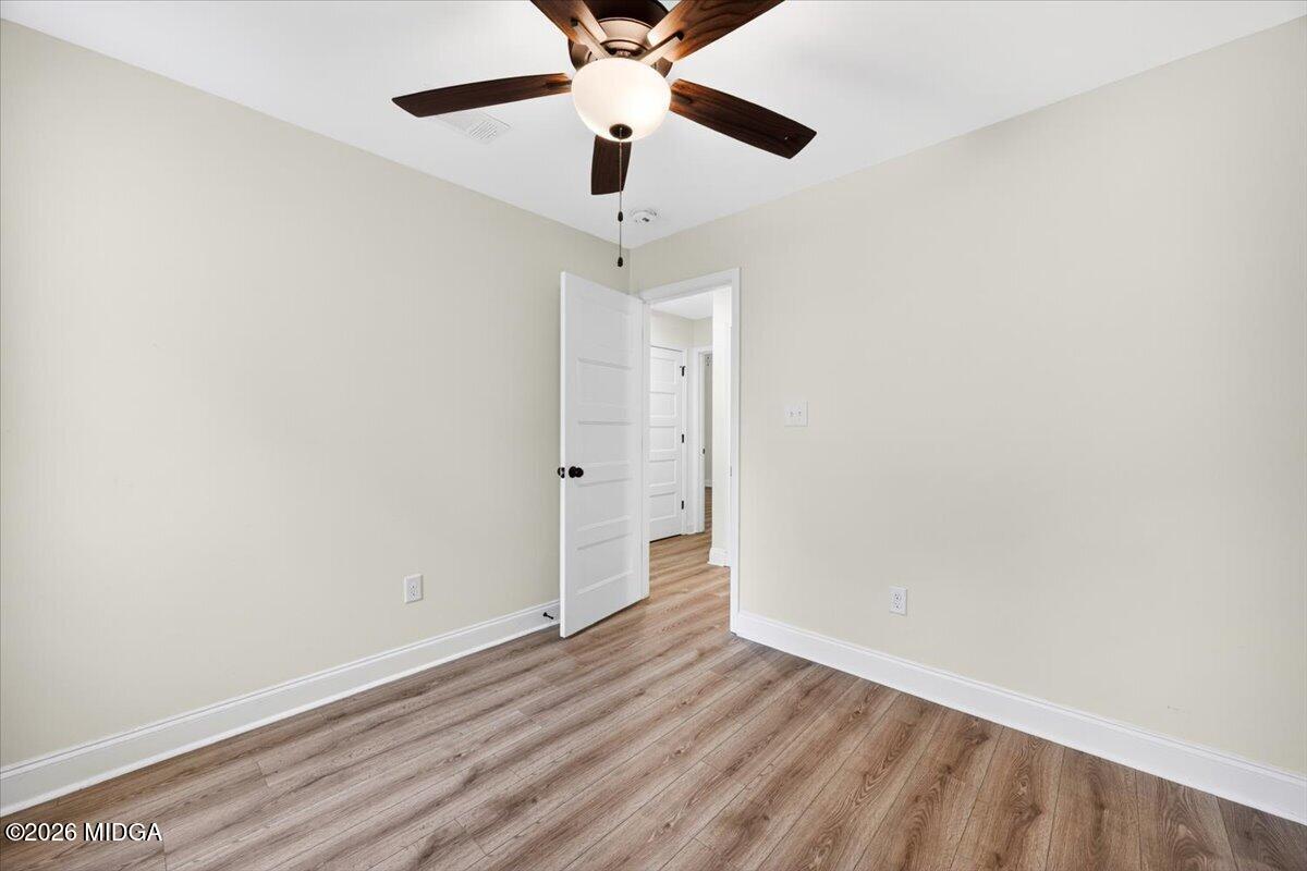 845 Natures Walk Gray, GA 31032 - Photo 15 of 21 wooden floor in an empty room