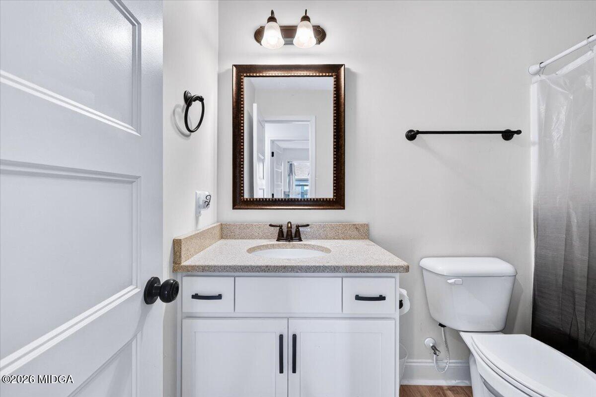 845 Natures Walk Gray, GA 31032 - Photo 18 of 21 a bathroom with a sink and a toilet