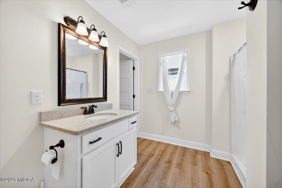 845 Natures Walk Gray, GA 31032 - Photo 19 of 21 a bathroom with a sink vanity granite and a mirror