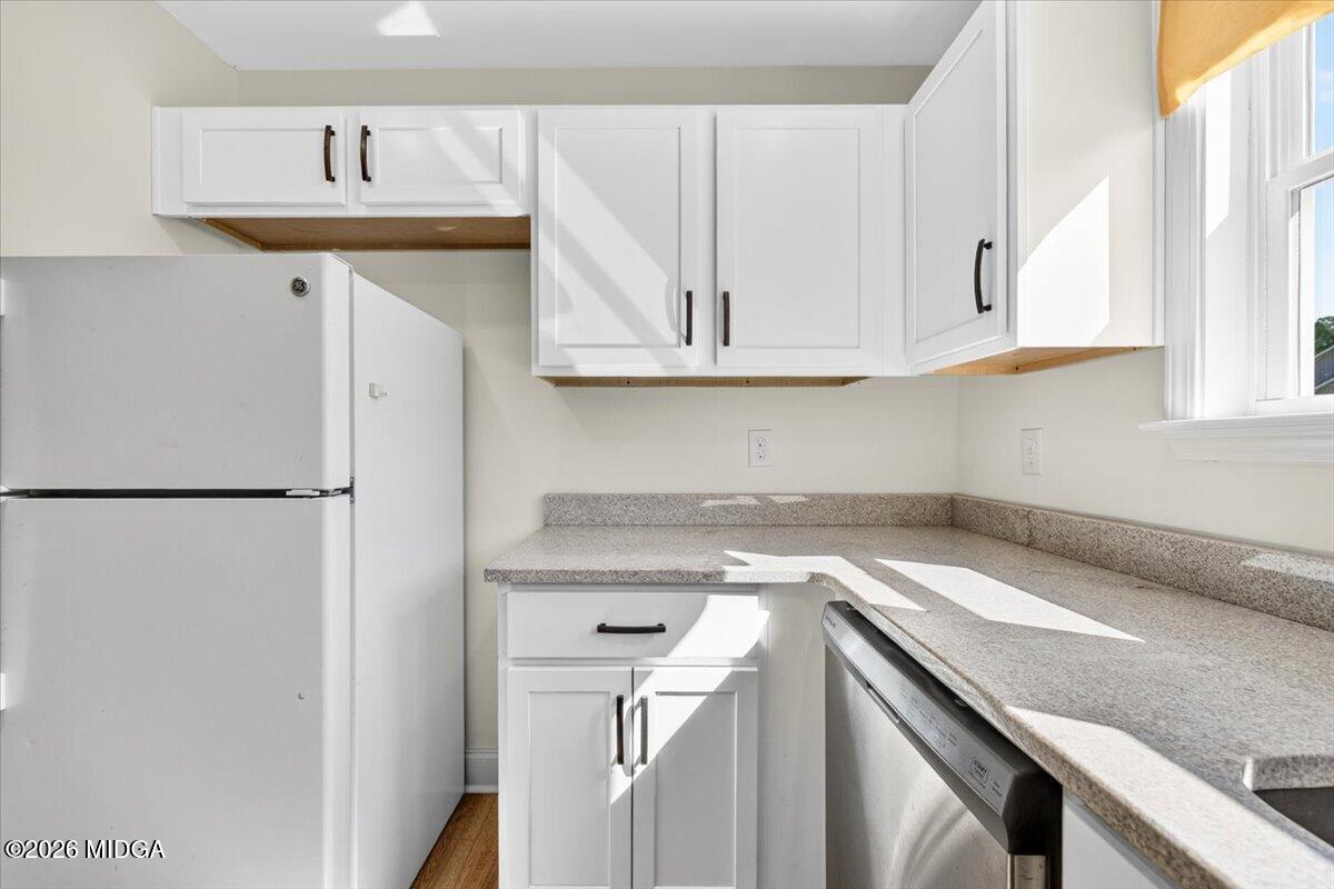 845 Natures Walk Gray, GA 31032 - Photo 9 of 21 a view of a kitchen with sink and cabinets