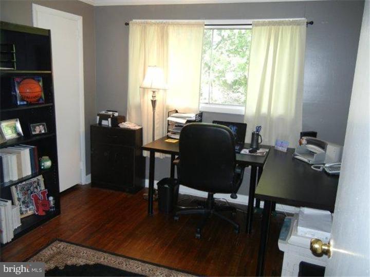 739 Spruce Road Warminster, PA 18974 - Photo 15 of 19 a view of a workspace with furniture and a window