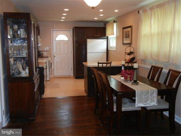 739 Spruce Road Warminster, PA 18974 - Photo 3 of 19 a view of a a dining room with furniture window and wooden floor
