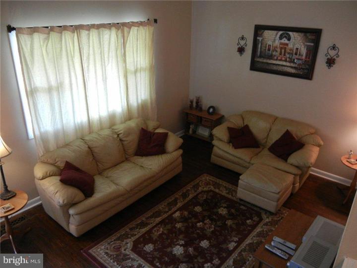 739 Spruce Road Warminster, PA 18974 - Photo 6 of 19 a living room with furniture and a window