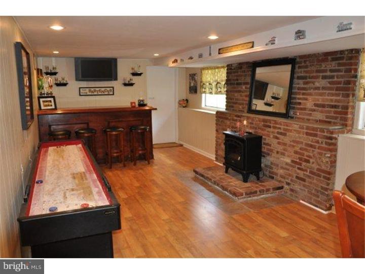739 Spruce Road Warminster, PA 18974 - Photo 8 of 19 a living room with furniture and a flat screen tv