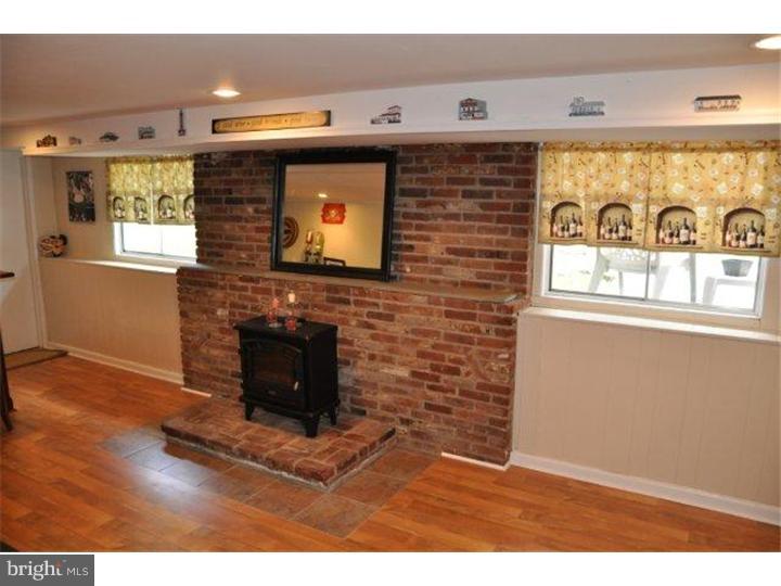 739 Spruce Road Warminster, PA 18974 - Photo 9 of 19 a view of a fireplace with window