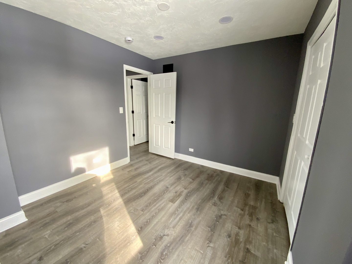 4014 Ridge Road Zion, IL 60099 - Photo 10 of 21 a view of empty room with wooden floor