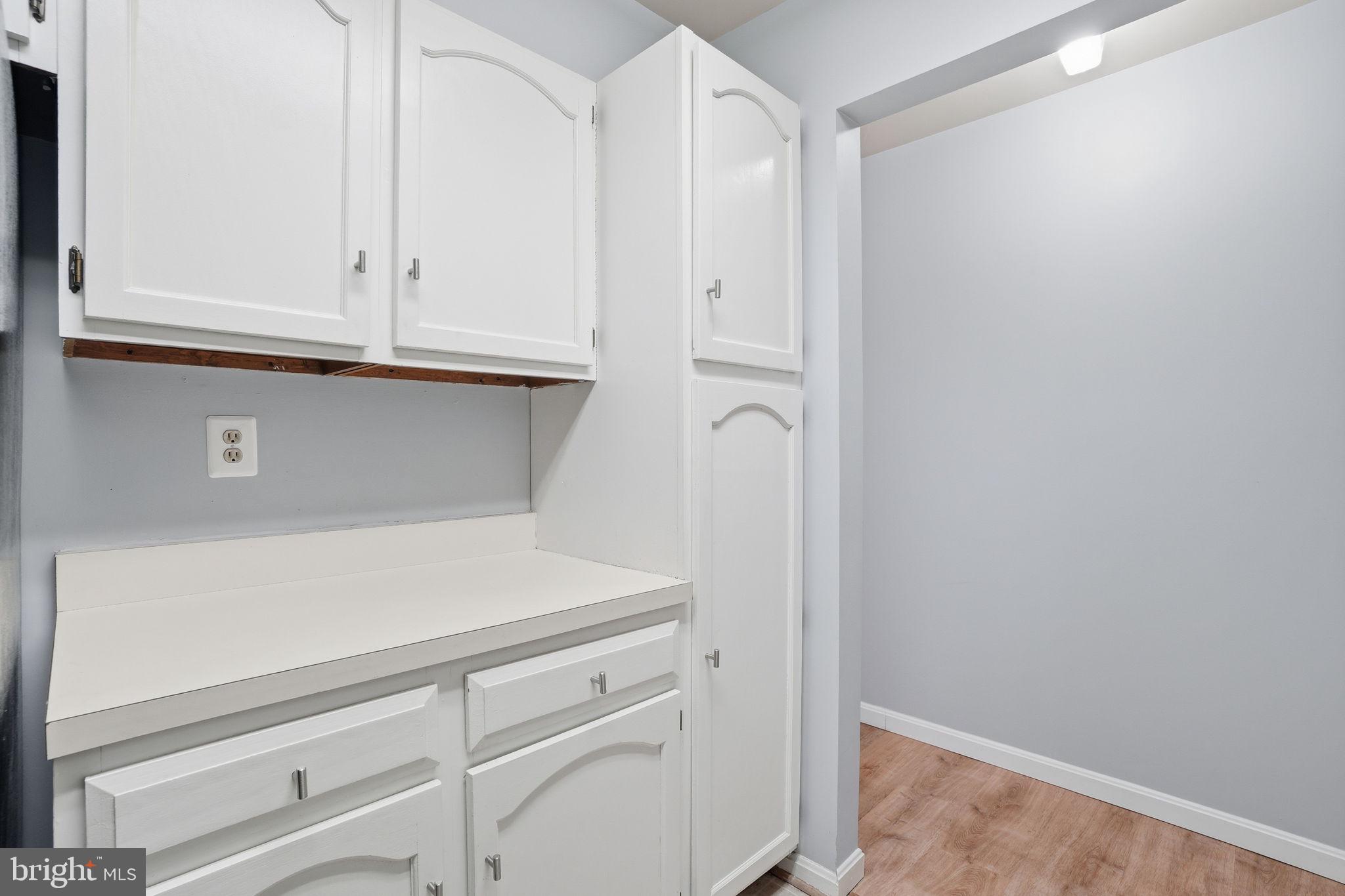5902 Cove Landing Road, Unit 203 Burke, VA 22015 - Photo 10 of 25 a view white cabinets