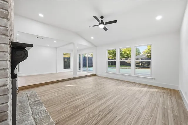 a kitchen with stainless steel appliances a sink and a refrigerator
