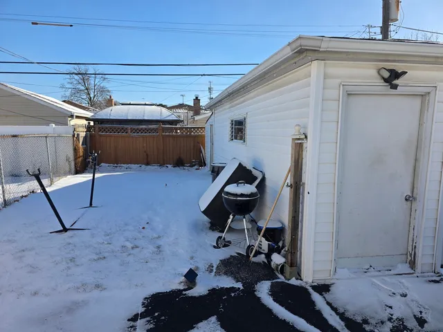a view of gym equipment and a view of living room