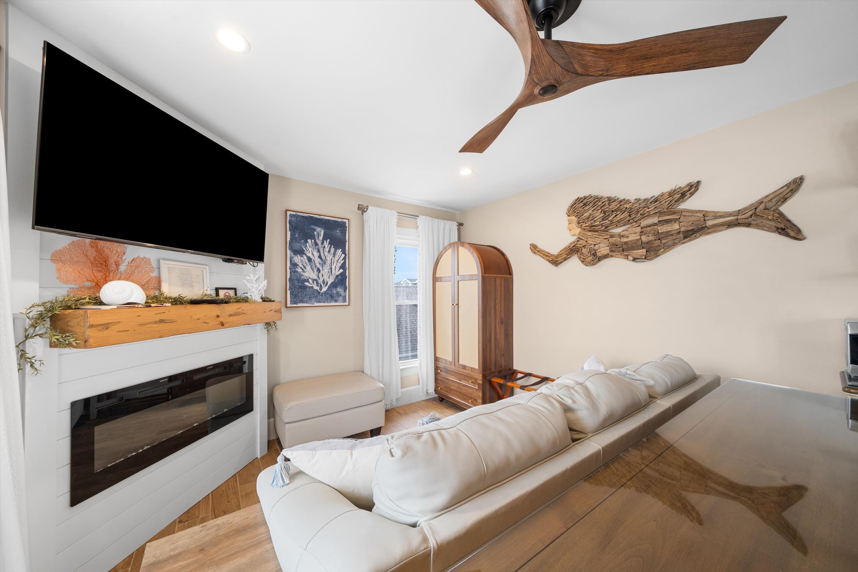 4600 Landis Avenue, Unit 3B Sea Isle City, NJ 08243 - Photo 11 of 29 a living room with furniture and a flat screen tv