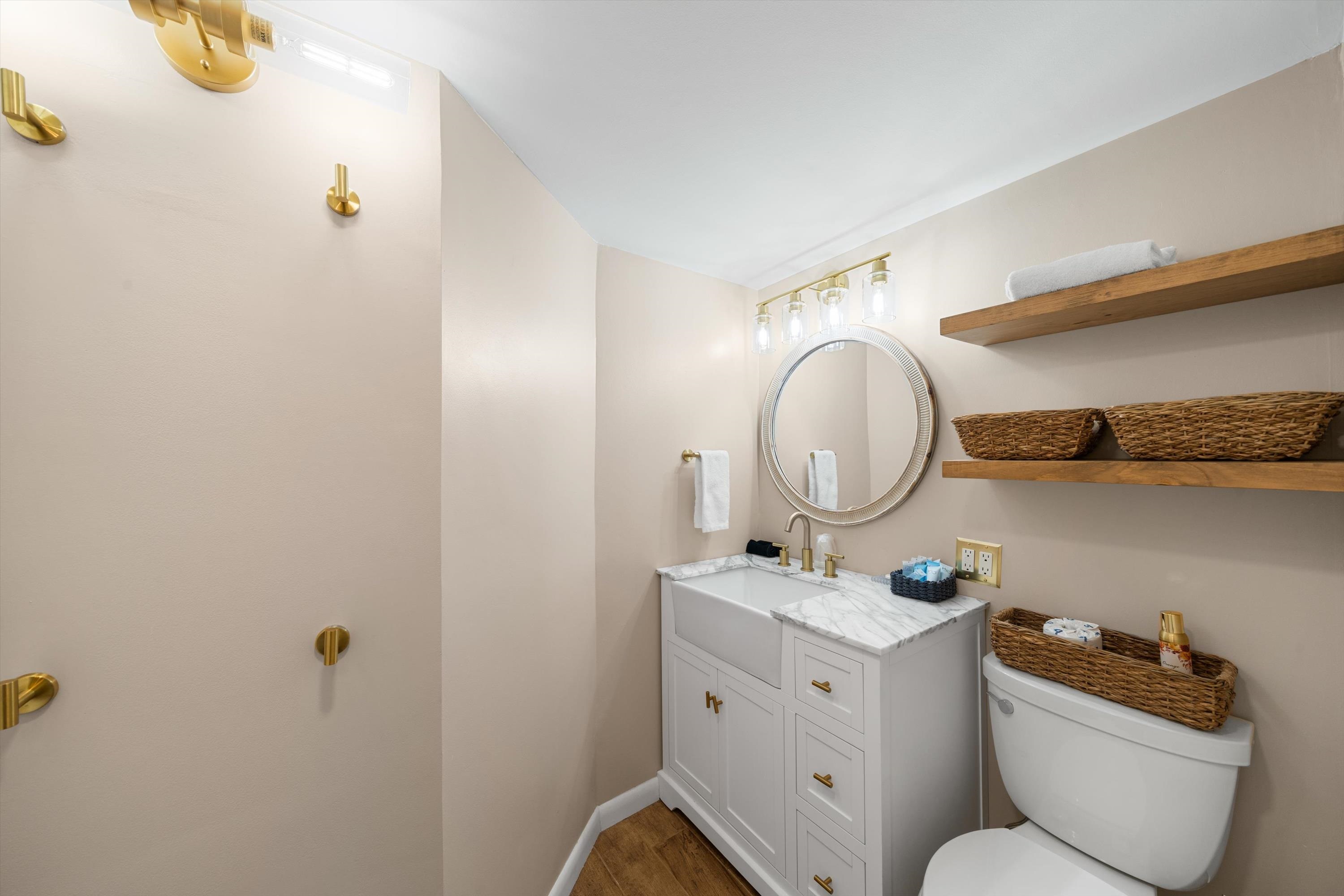 4600 Landis Avenue, Unit 3B Sea Isle City, NJ 08243 - Photo 15 of 29 a bathroom with a toilet a sink and a mirror