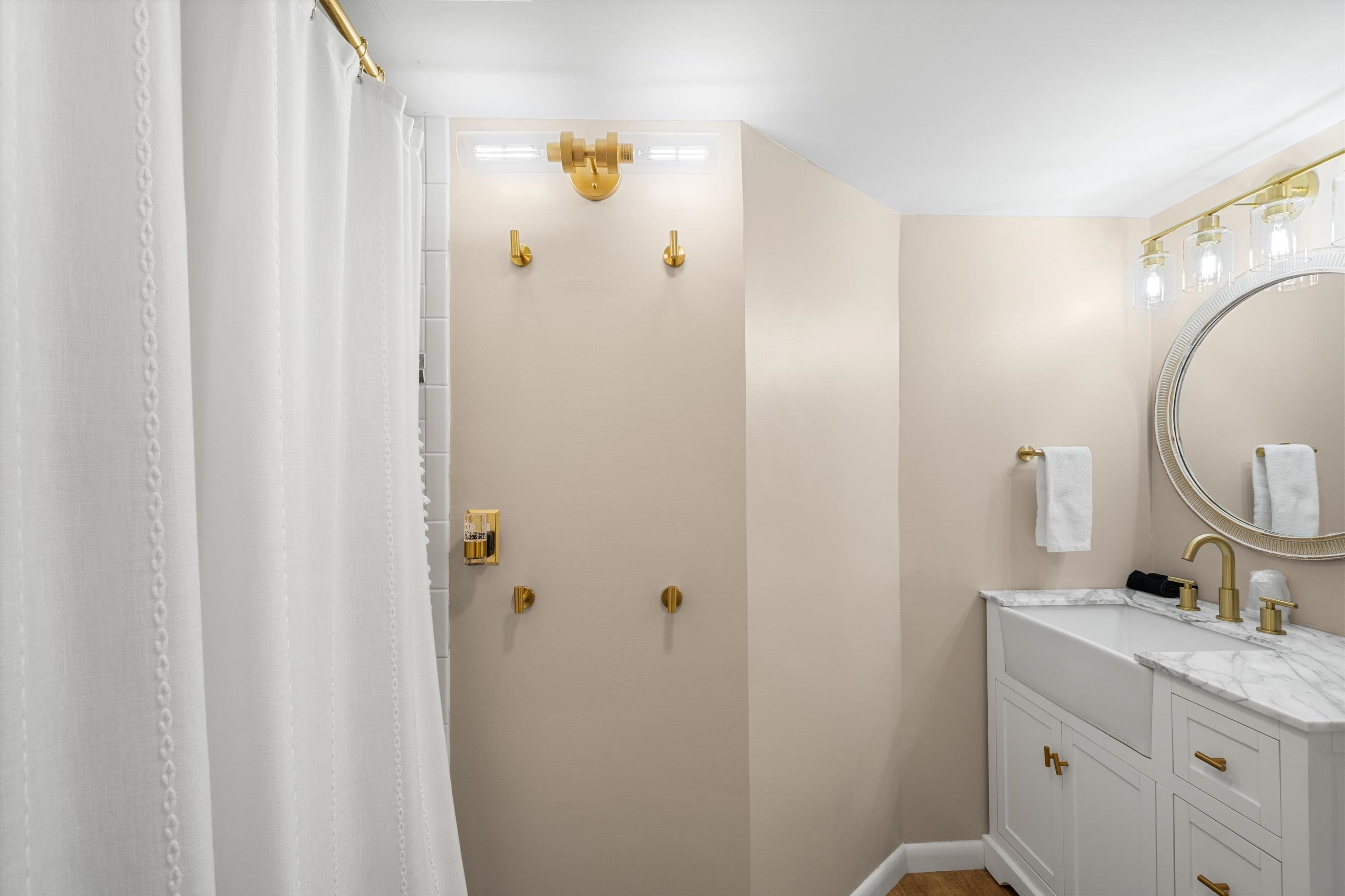 4600 Landis Avenue, Unit 3B Sea Isle City, NJ 08243 - Photo 17 of 29 a bathroom with a granite countertop sink toilet and shower