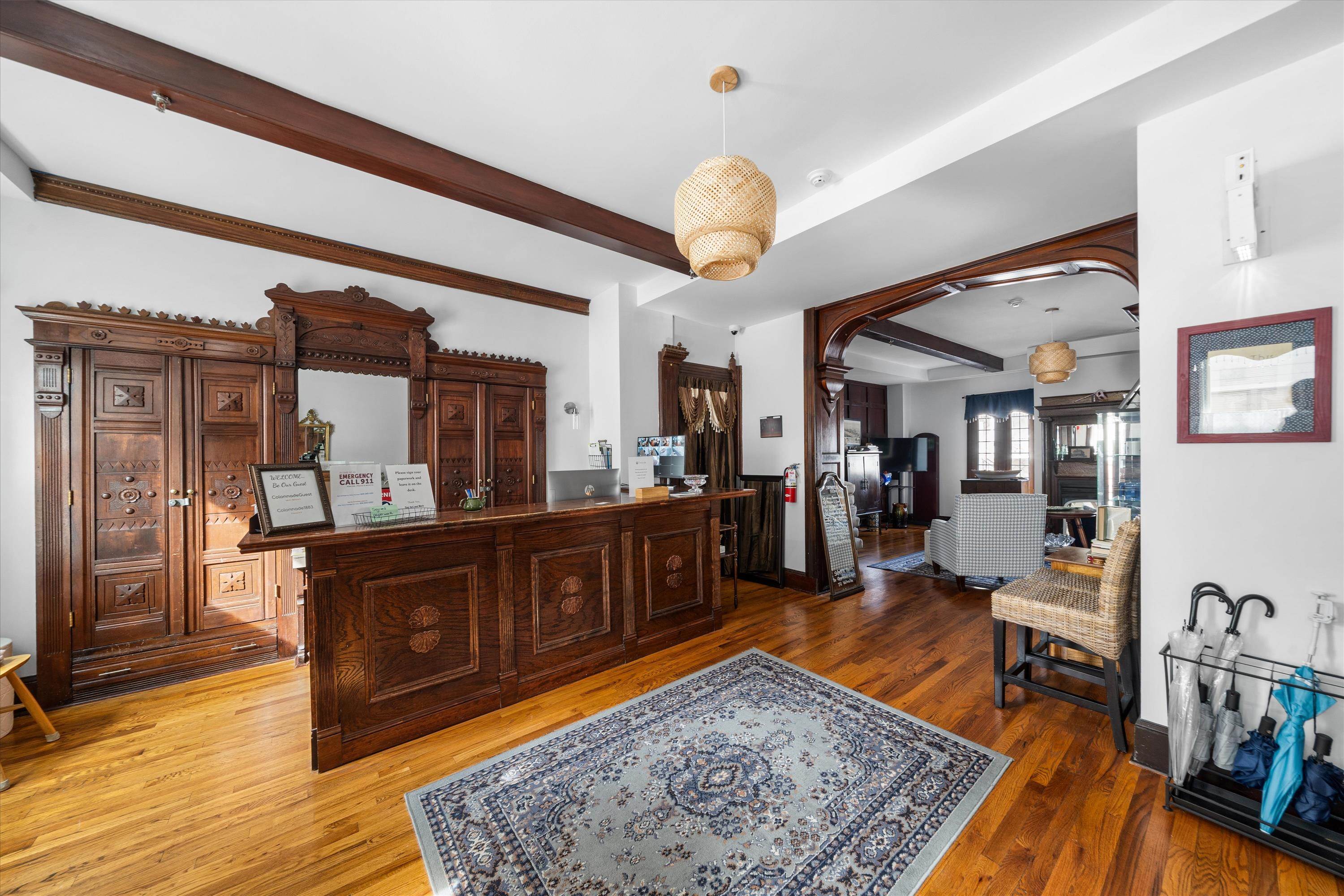 4600 Landis Avenue, Unit 3B Sea Isle City, NJ 08243 - Photo 27 of 29 a living room with furniture and a wooden floor