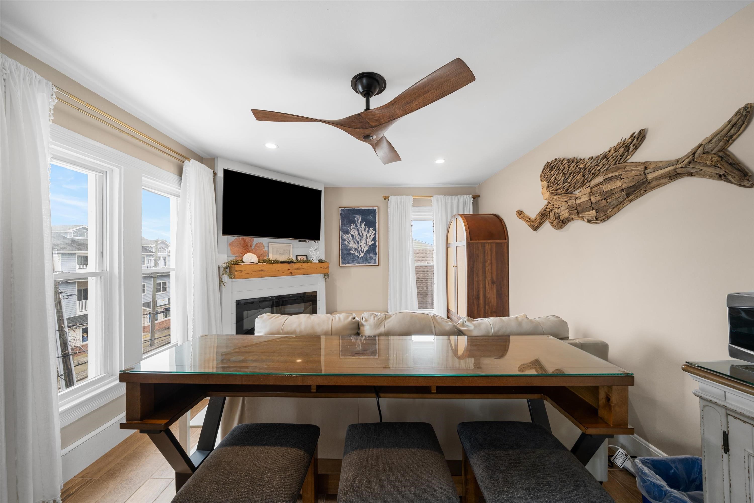 4600 Landis Avenue, Unit 3B Sea Isle City, NJ 08243 - Photo 3 of 29 a view of a livingroom with furniture and a flat screen tv