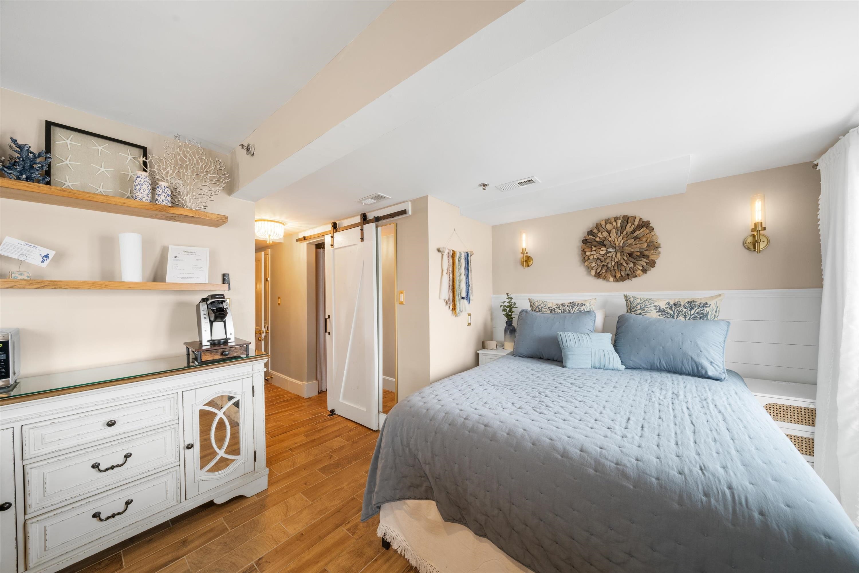 4600 Landis Avenue, Unit 3B Sea Isle City, NJ 08243 - Photo 6 of 29 a bedroom with a large bed and a window