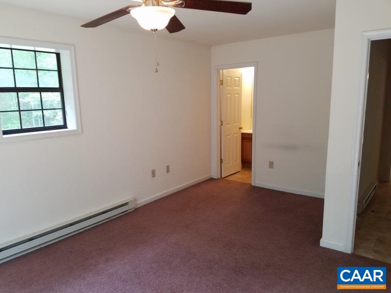 11776 Howardsville Road Howardsville, VA 24562 - Photo 4 of 11 an empty room with a window