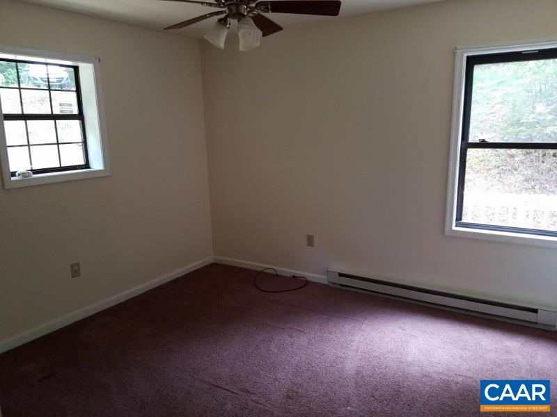 11776 Howardsville Road Howardsville, VA 24562 - Photo 6 of 11 an empty room with a window