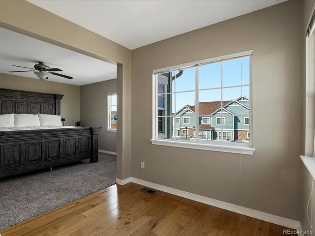 a bathroom with a sink a toilet and shower a mirror
