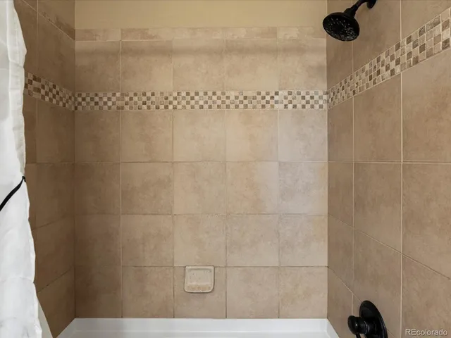 a view of a livingroom with furniture and a projector