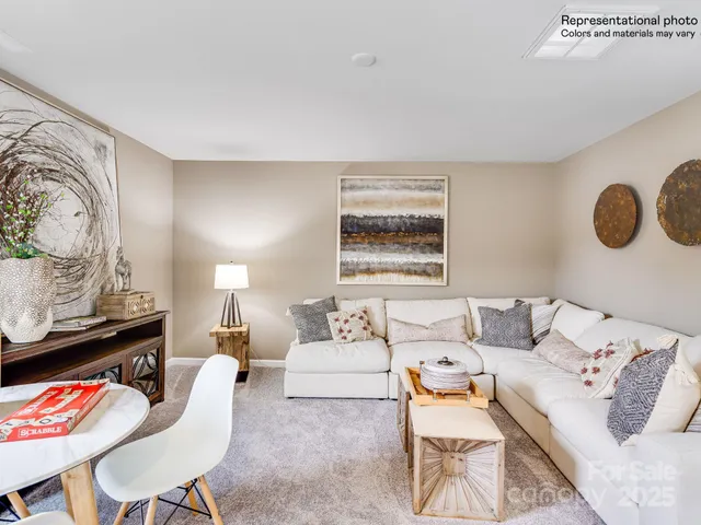a living room with furniture and rug