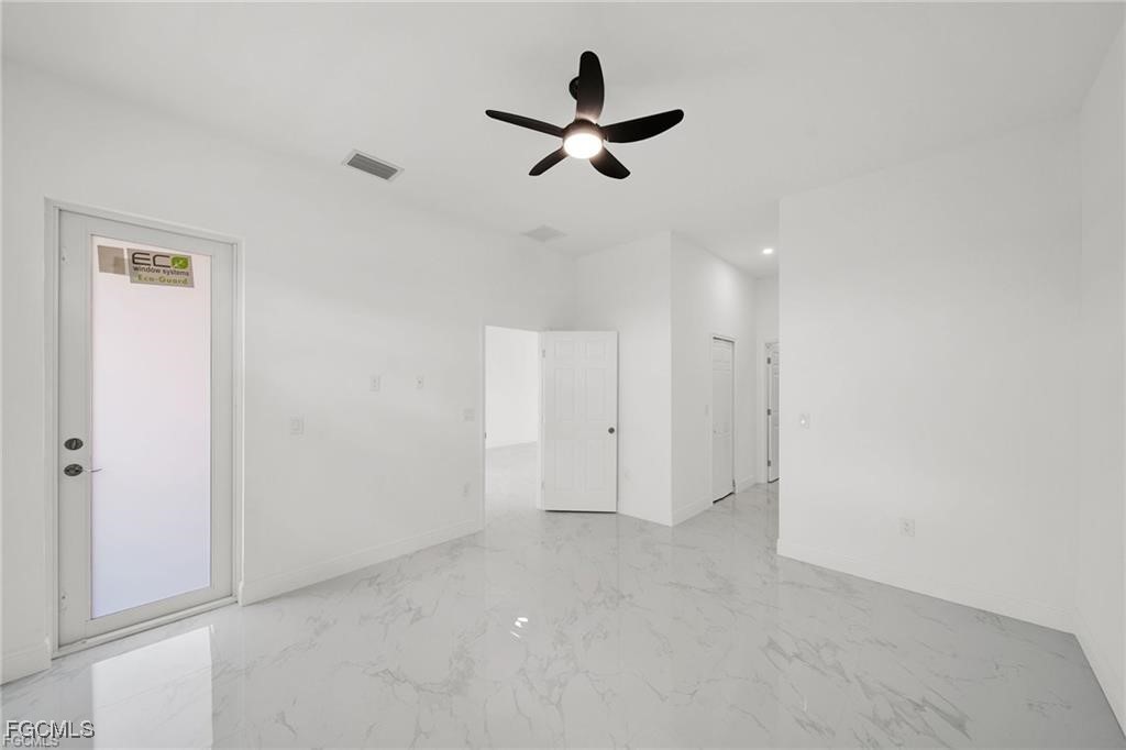 4768 Nelson Drive Lehigh Acres, FL 33973 - Photo 17 of 30 a view of an empty room