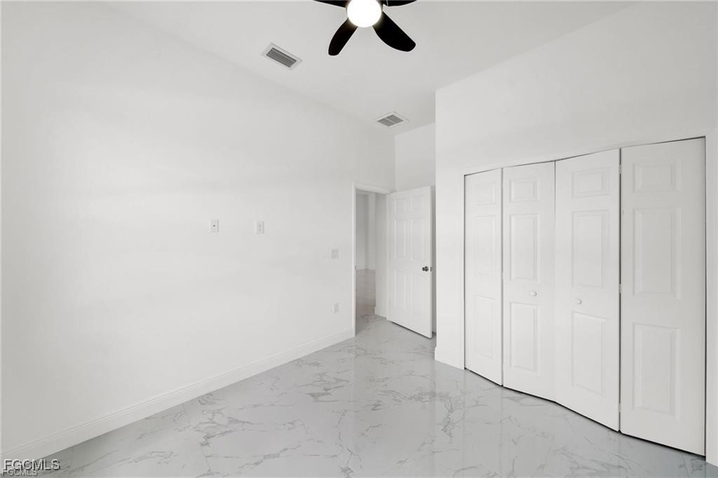 4768 Nelson Drive Lehigh Acres, FL 33973 - Photo 28 of 30 a view of an empty room
