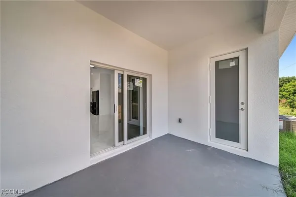 a view of storage and utility room with racks on the wall