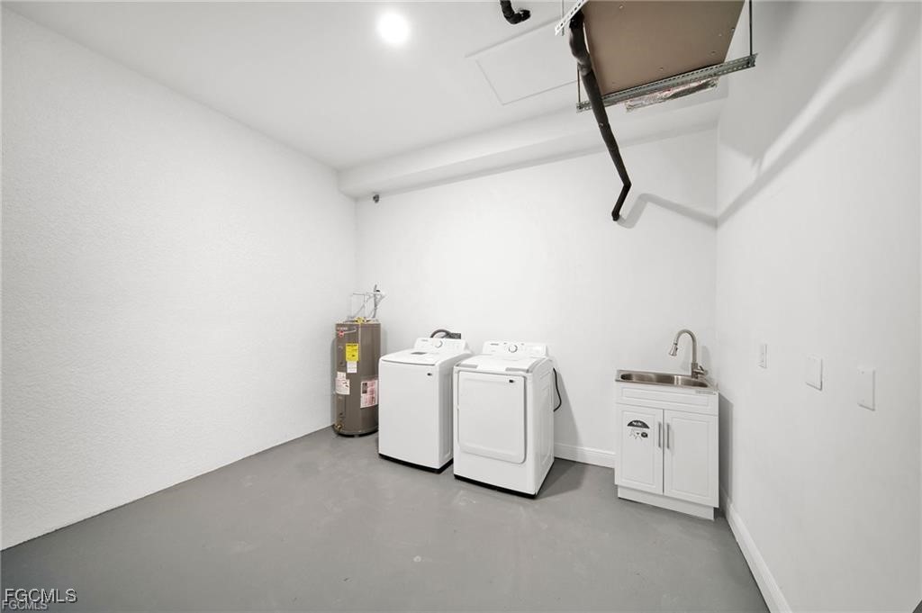 4768 Nelson Drive Lehigh Acres, FL 33973 - Photo 30 of 30 a view of storage and utility room with racks on the wall