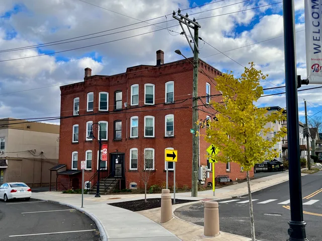 a front view of a building with street view