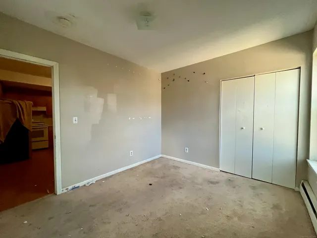 an empty room with closet