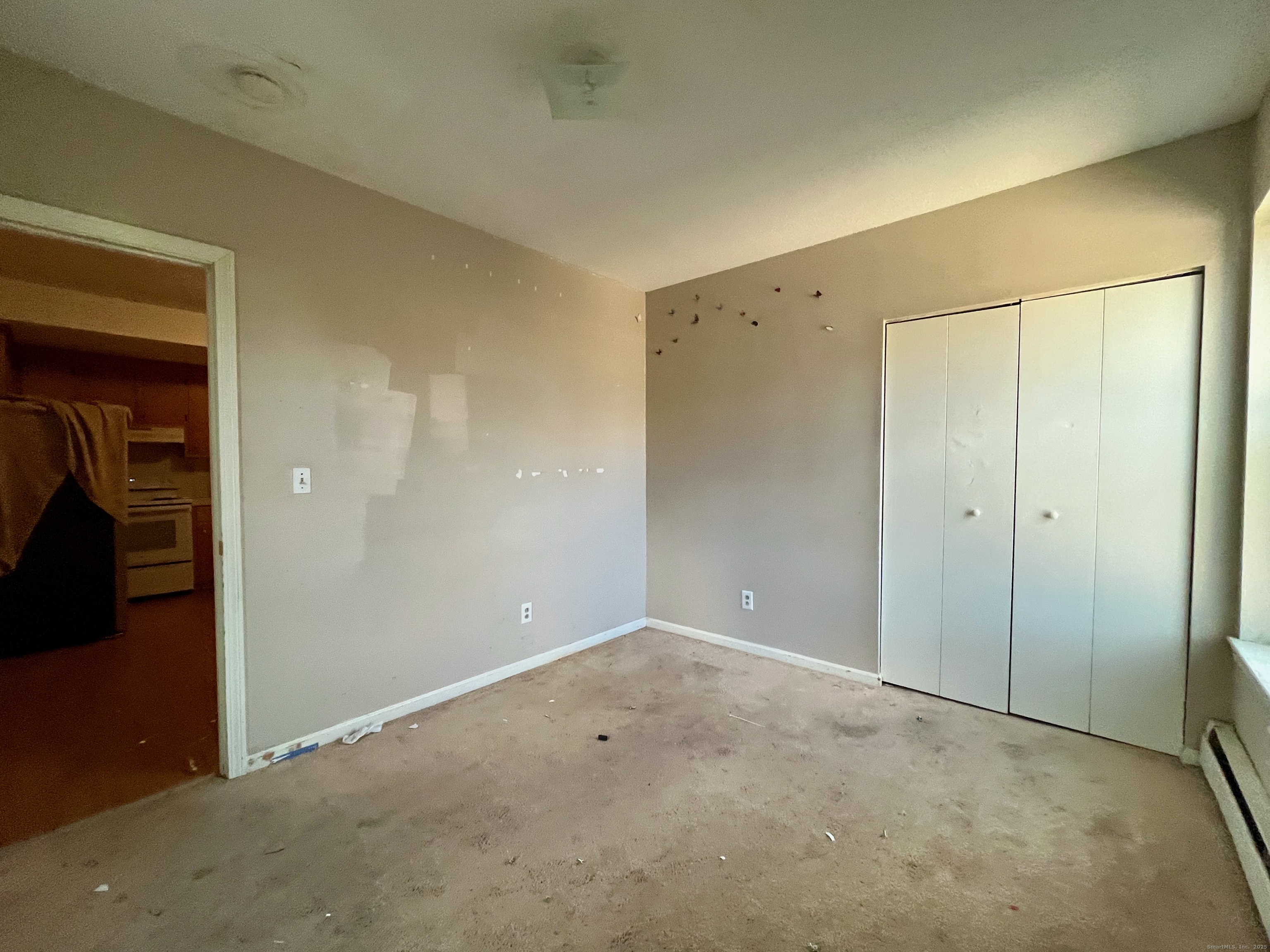 19 Divinity Street, Unit 3E Bristol, CT 06010 - Photo 16 of 16 an empty room with closet