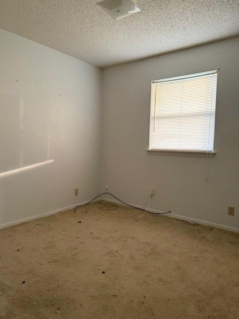 329 Walnut Avenue Azle, TX 76020 - Photo 3 of 13 an empty room with a window