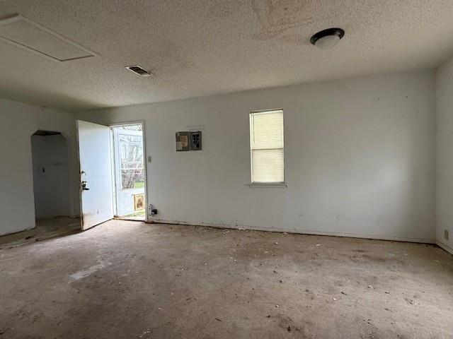 329 Walnut Avenue Azle, TX 76020 - Photo 6 of 13 an empty room with windows